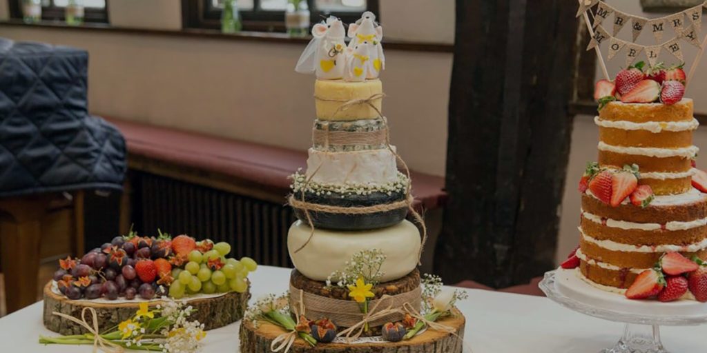 a tower of cheese prepared for a wedding