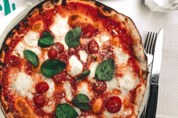 The Ultimate Wine and Food Pairing Guide 8 Pizza with mozzarella and tomato