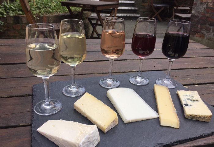 virtual cheese and wine pairings 5 wine and cheese pairings on a black slate